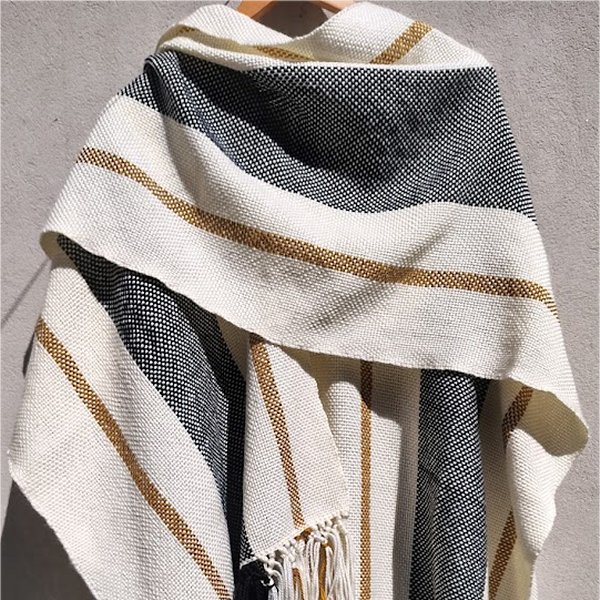 Ruanas tejidas en telar artesanales Kalkin